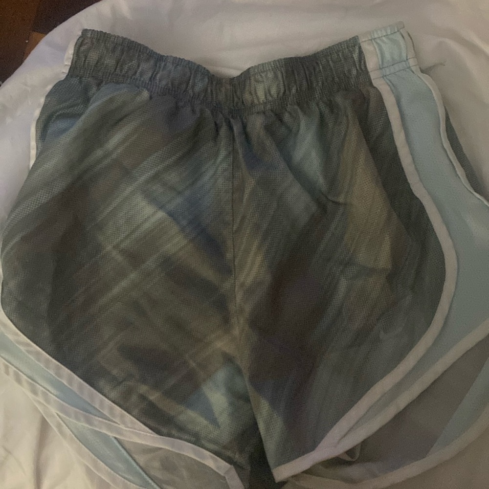 Nike dri- fit grey with blue shorts. Xs good condition